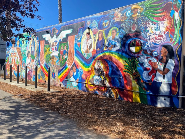 Colforul mural in Fruitvale showing  scenes of the Chicano movement of the era and of the indigenous ancestors. Th