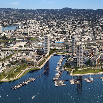 Aerial view rendering of the Brooklyn Basin mixed use development, facing the East Bay hills. Courtesy Signature Development Group.