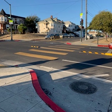 Photo of new centerline hardening to improve left-turn safety outside Garfield Elementary